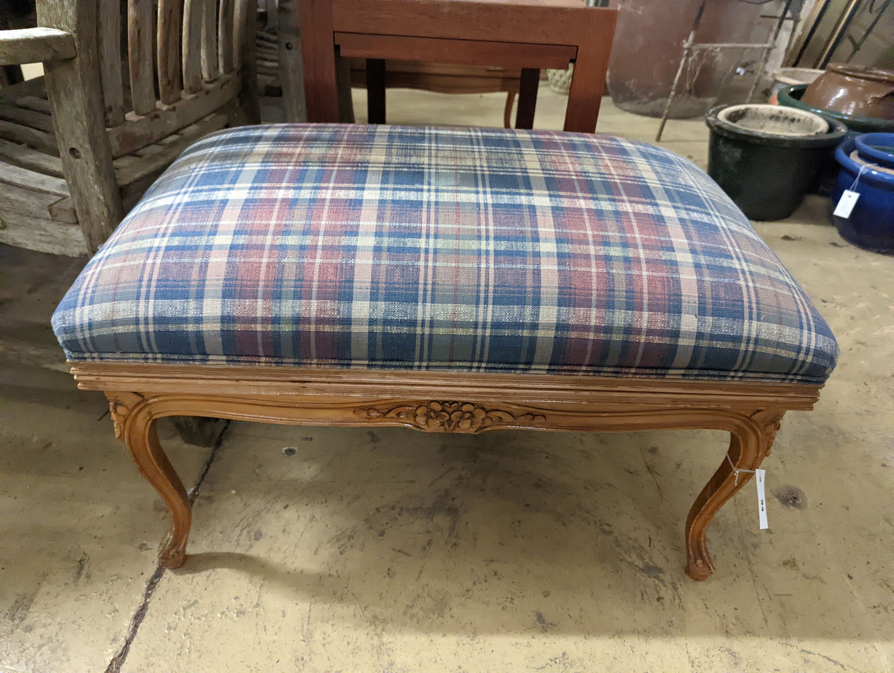 A pair of French carved beech upholstered stools combined luggage racks, width 80cm, depth 50cm, height 46cm